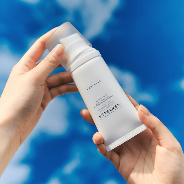 Skin1004 Centella Tone Brightening Sunscreen Protector solar con niacinamida y color melocotón 50ml